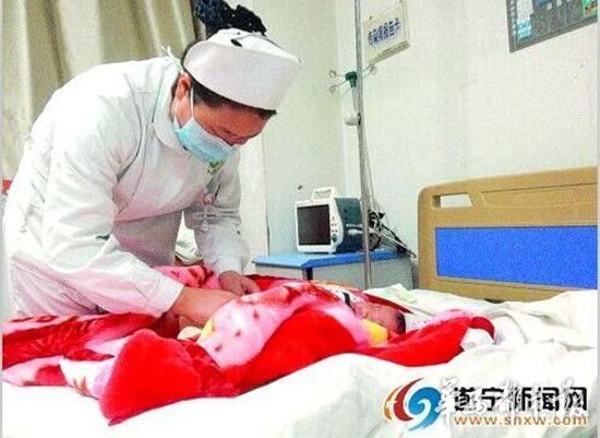 待产孕妇骑摩托车摔晕 医生剖腹取出8.3斤男婴